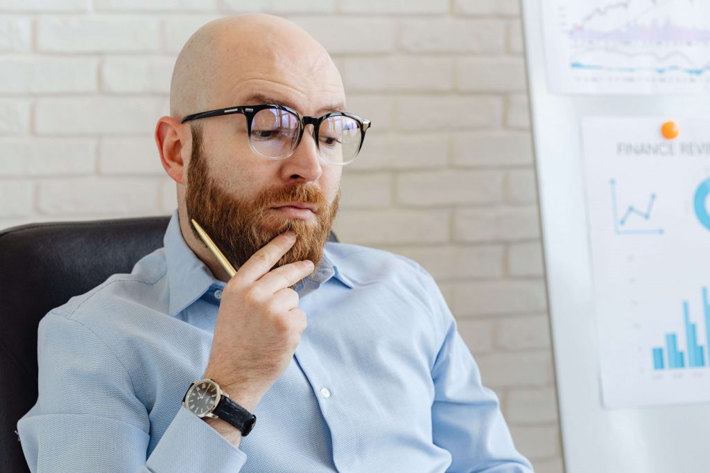 Man deep in thought, illustrating the intrusive thoughts and hypervigilance explored in EMDR therapy for men in Colorado Springs, CO.