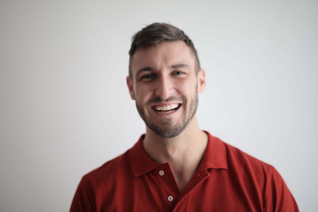 Smiling man, symbolizing emotional balance, resilience, and lasting relief supported through anxiety therapy for men in Colorado Springs, CO.