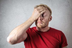 Frustrated man, representing anger and emotional challenges that can affect relationships and be addressed through anger management in Colorado Springs, CO.