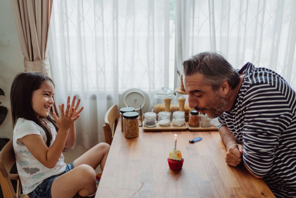 Man spending quality time with his child, representing meaningful family connection and new routines after divorce.